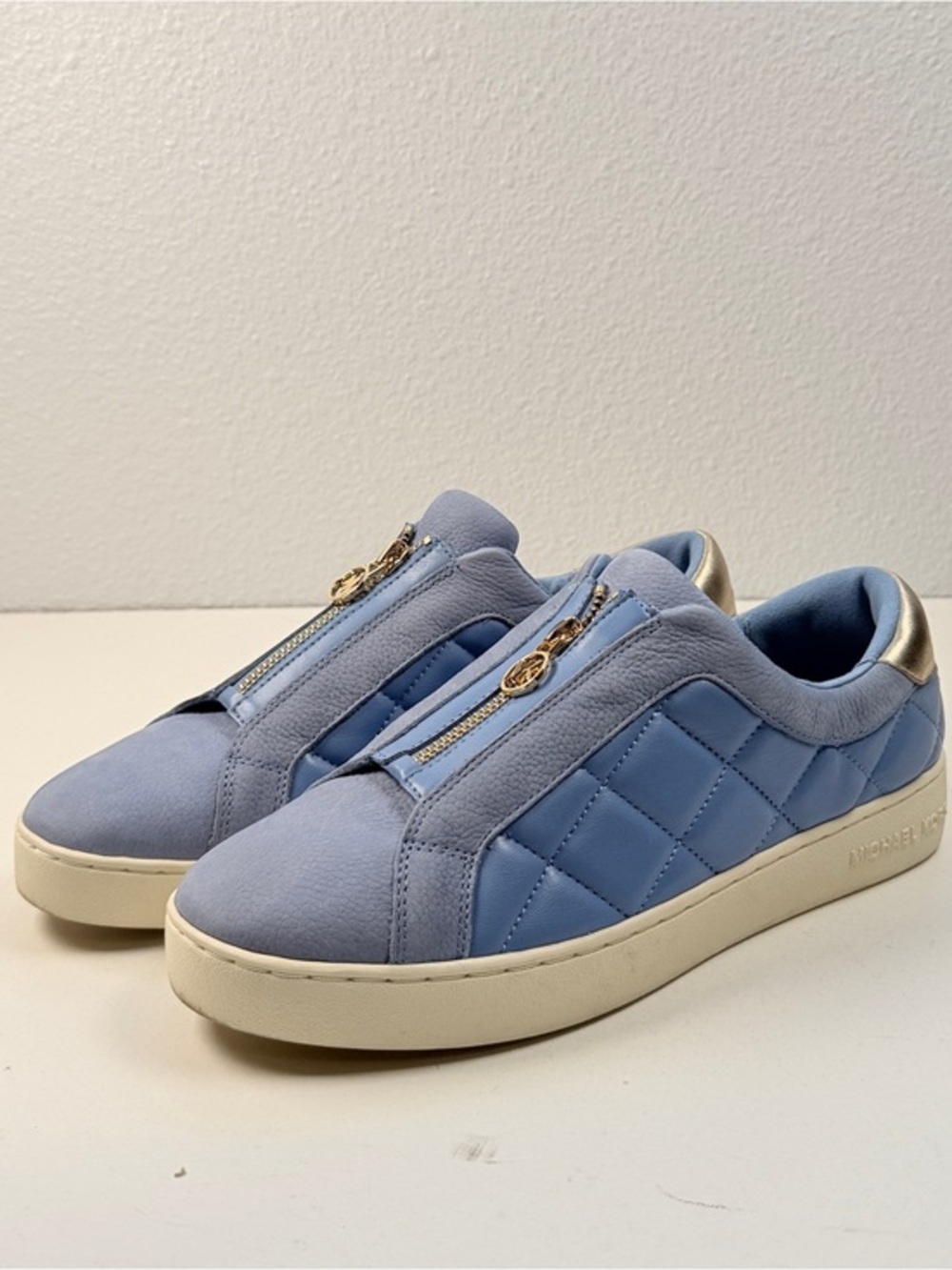 Michael Kors Keaton Zip Slip On Sneakers Light Blue Quilted Gold Logo Womens 9.5